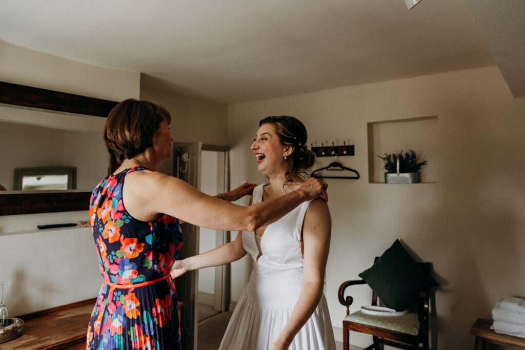 Bride hugging mum at The Normans York