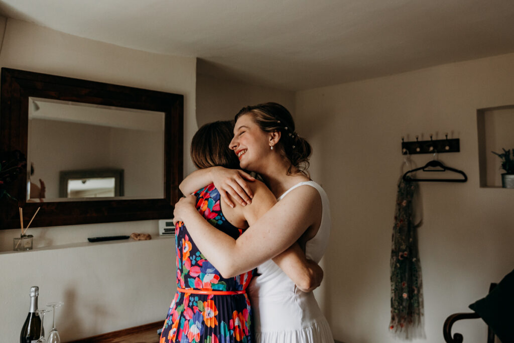 Bride hugging mum at The Normans York