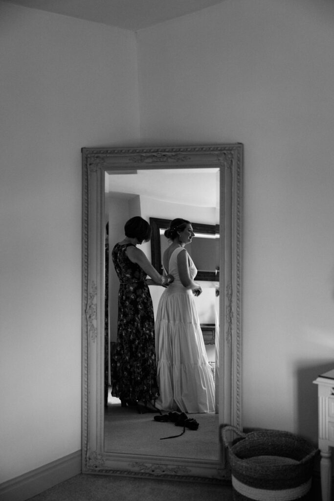 Mirror shot of bride getting ready at The Normans York