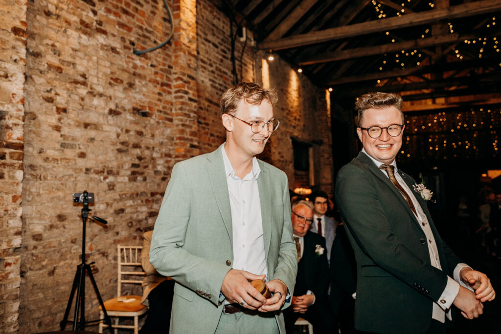 Bestman handing over rings at The Normans York
