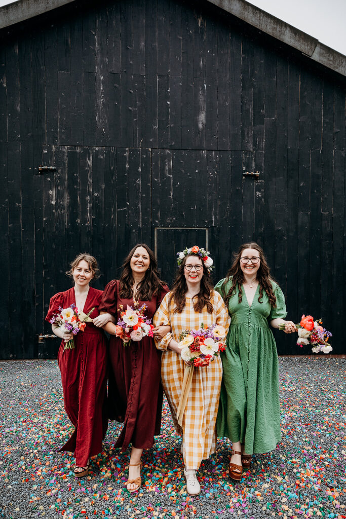 Bridesmaids walking at The Giraffe Shed