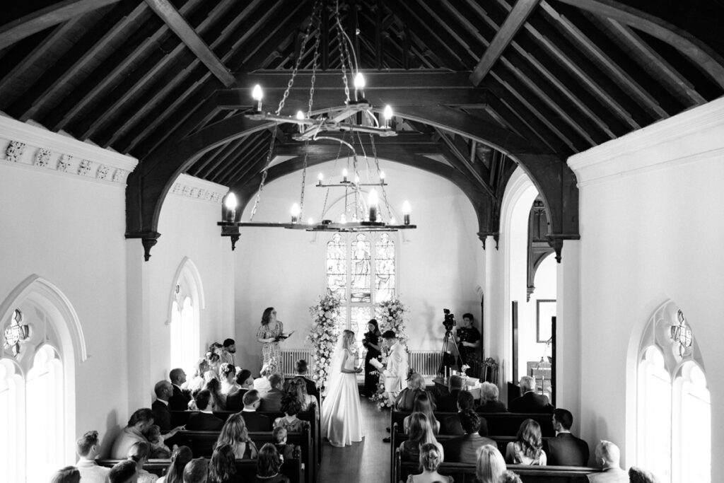 Wedding ceremony from balcony in Chapel at Thicket Priory