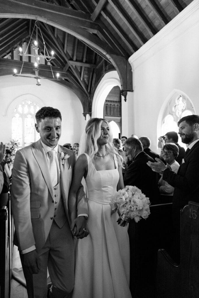 Bride and Groom exit at Thicket Priory