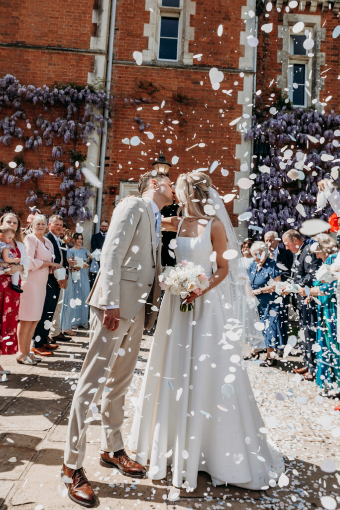 Confetti kiss at Thicket Priory