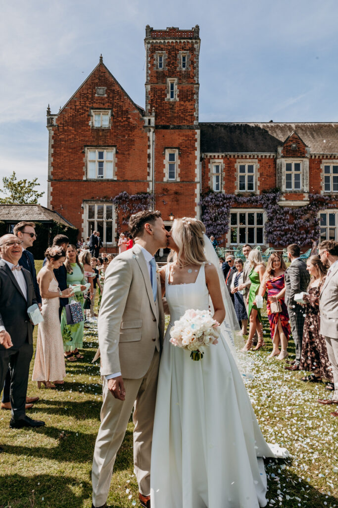 Confetti kiss at Thicket Priory
