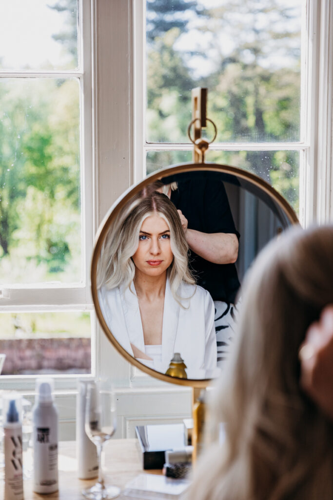 Bride in mirror at Thicket Priory