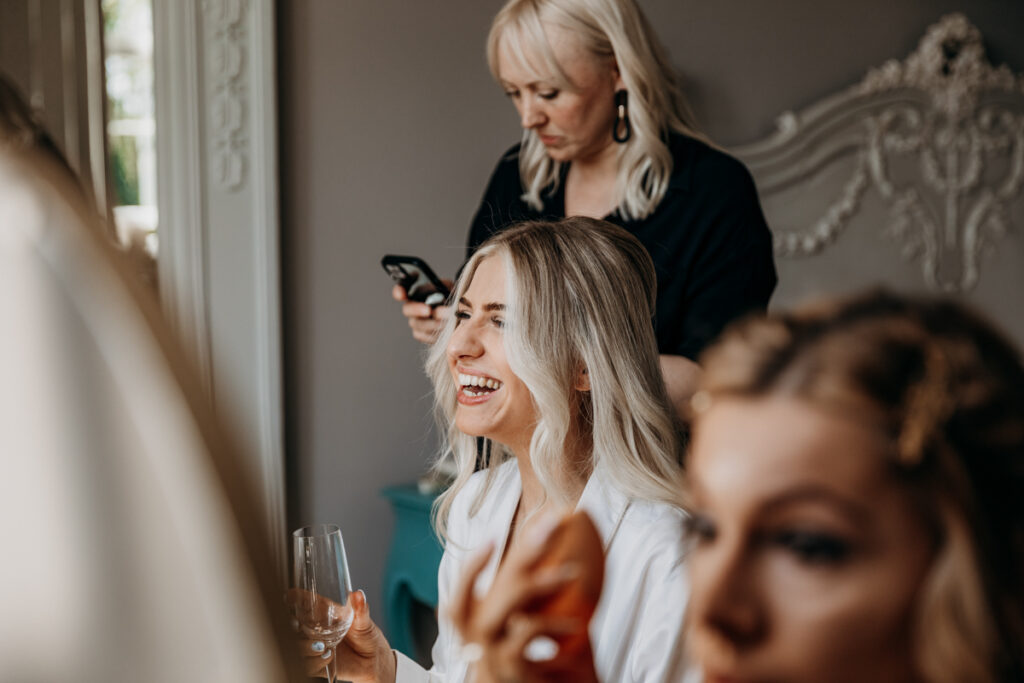Bride laughing at Thicket Priory