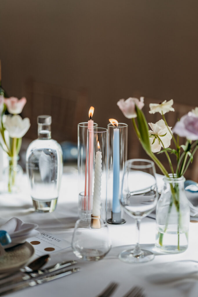Tables candles and flowers at Thicket Priory