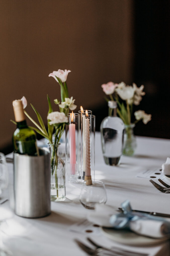 Table candles and flowers at Thicket Priory