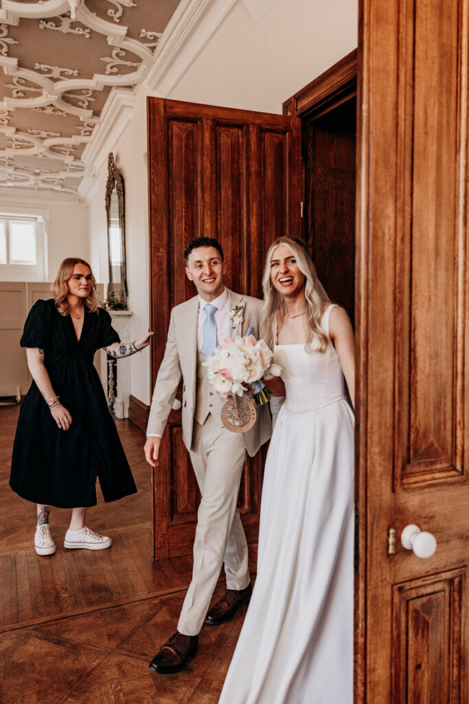 Bride and Groom viewing dining room at Thicket Priory