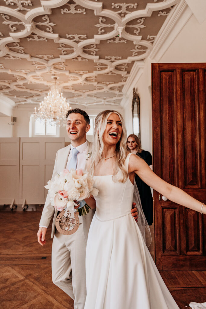 Bride and Groom viewing dining room at Thicket Priory