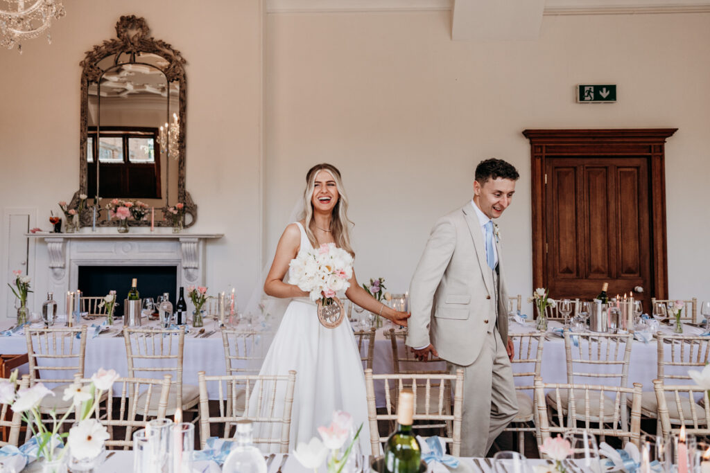 Bride and Groom viewing dining room at Thicket Priory