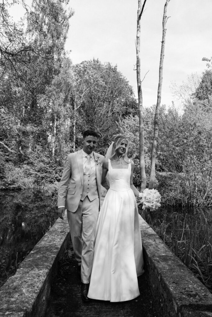 Bride and Groom walking at Thicket Priory