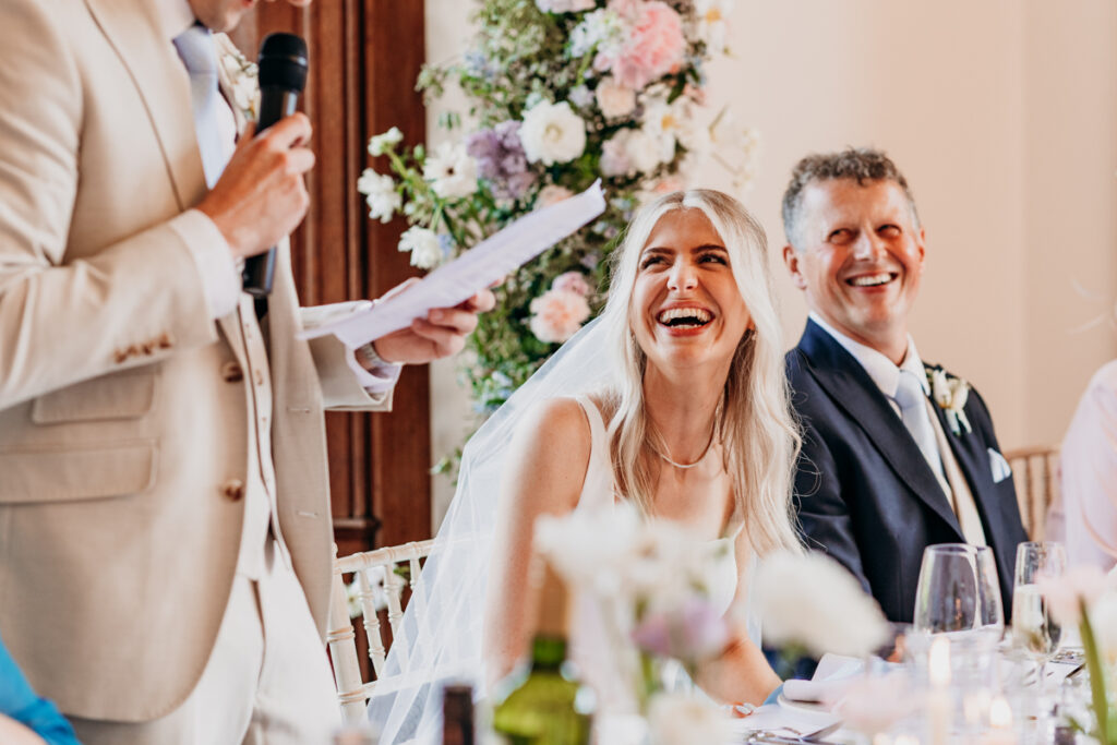 Bride laughing at Thicket Priory