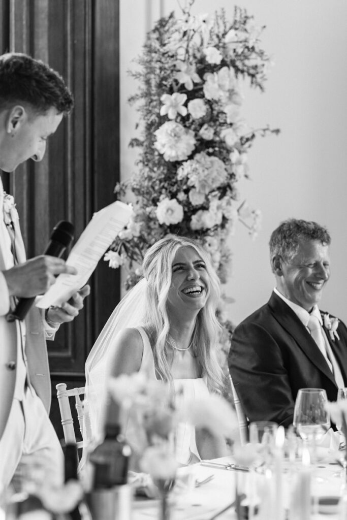 Bride laughing at Thicket Priory