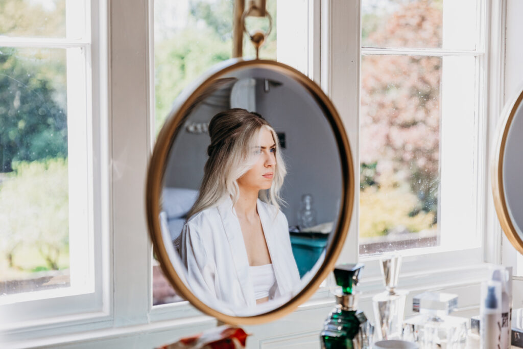 Bride in mirror at Thicket Priory