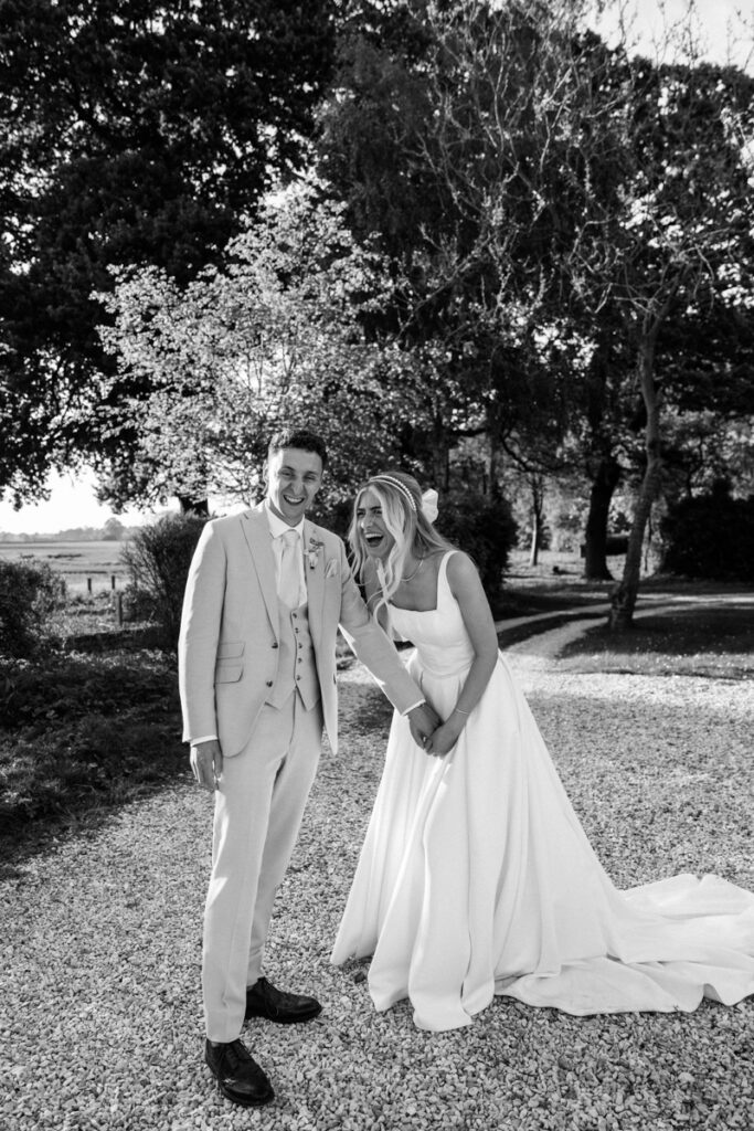 Couple laughing at Golden Hour at Thicket Priory