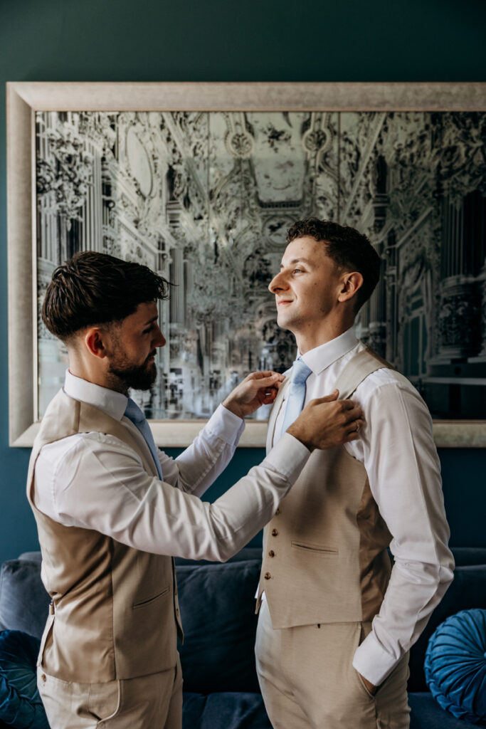 Groom getting dressed at Thicket Priory
