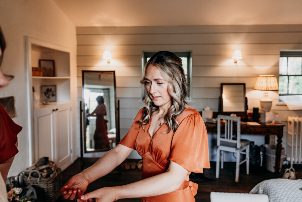 Bridesmaid helping at Middleton Lodge