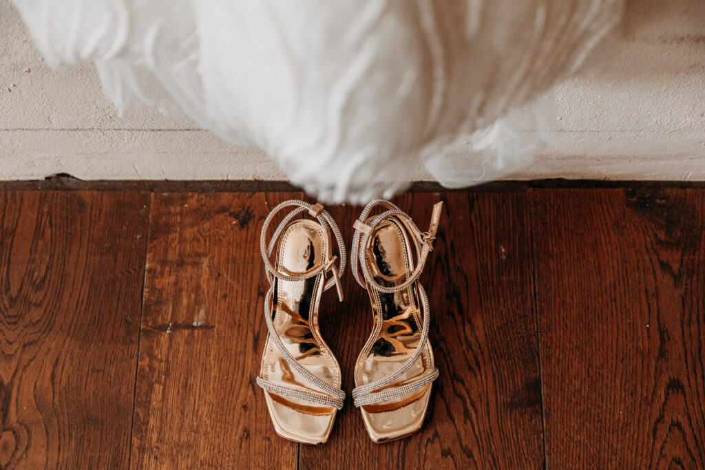 Gold bridal shoes at Middleton Lodge