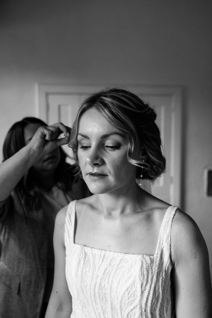 Bride having hair done by Chrys Chapman