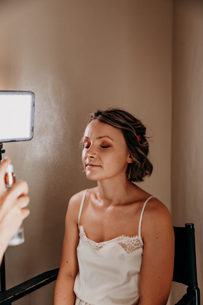 Bride having make up at Middleton Lodge