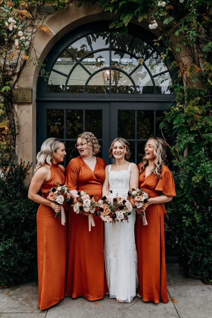 Bridesmaids laughing at Middleton Lodge