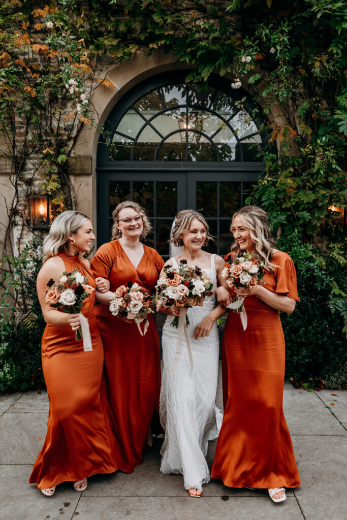 Bridesmaids laughing at Middleton Lodge
