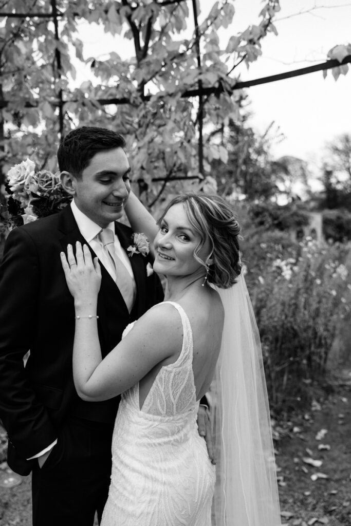 Bride and groom in black and white at Middleton Lodge