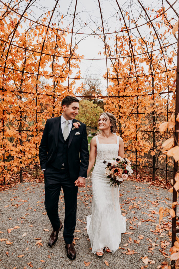 Bride and groom in Autumn at Middleton Lodge