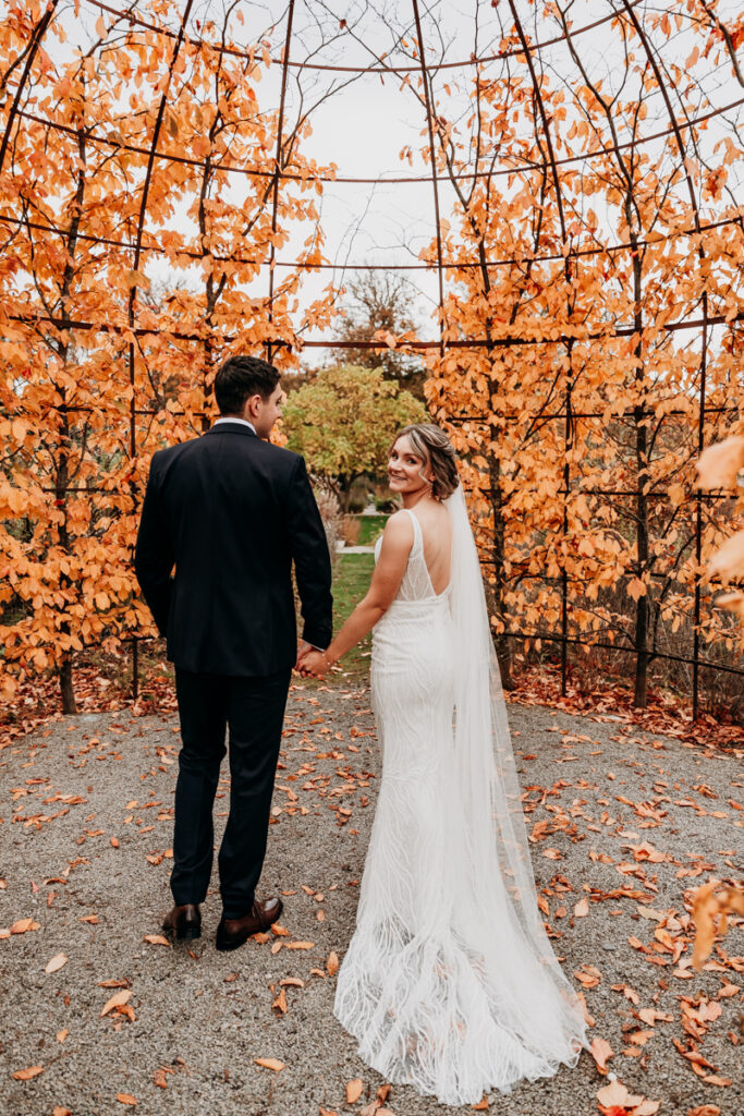 Bride and groom in Autumn at Middleton Lodge