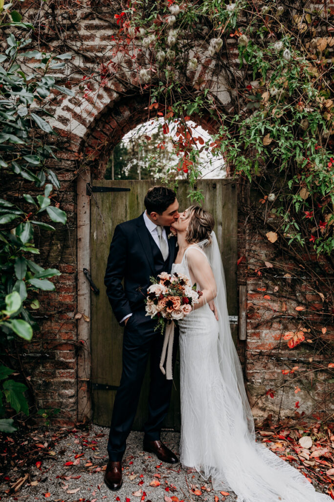 Bride and groom in walled garden at Middleton Lodge