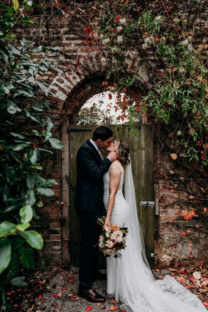 Bride and groom in walled garden at Middleton Lodge