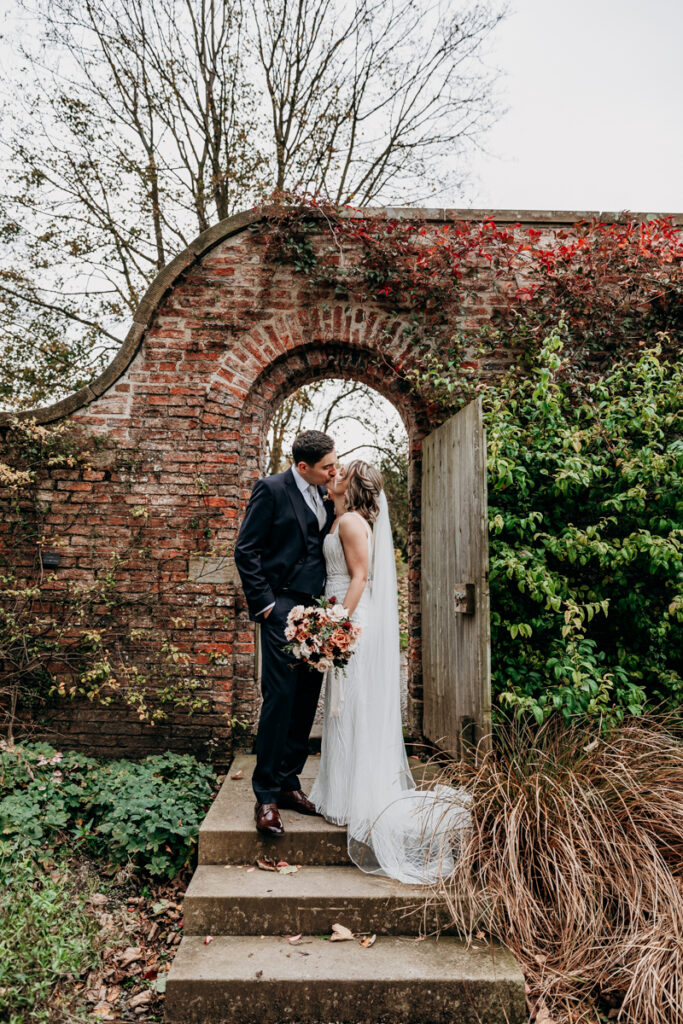 Bride and groom in walled garden at Middleton Lodge