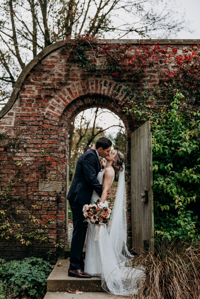 Bride and groom in walled garden at Middleton Lodge