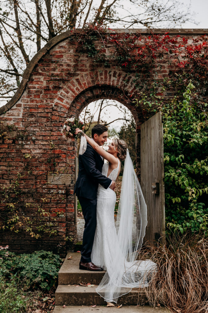 Bride and groom in walled garden at Middleton Lodge