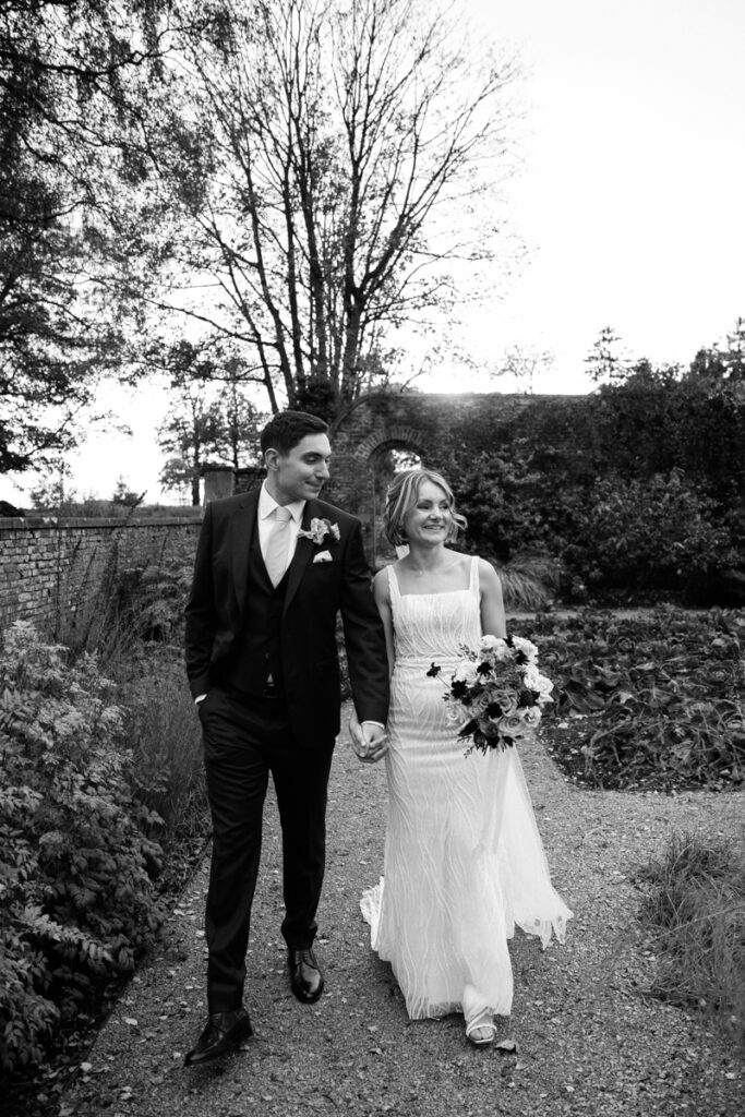 Bride and groom in walled garden at Middleton Lodge