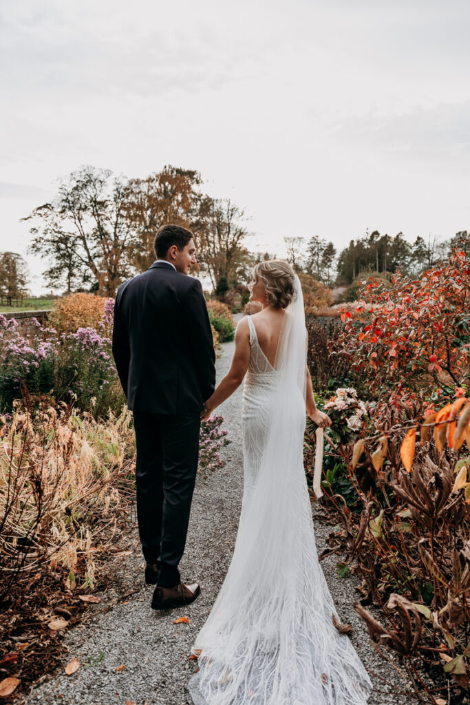 Bride and groom in walled garden at Middleton Lodge