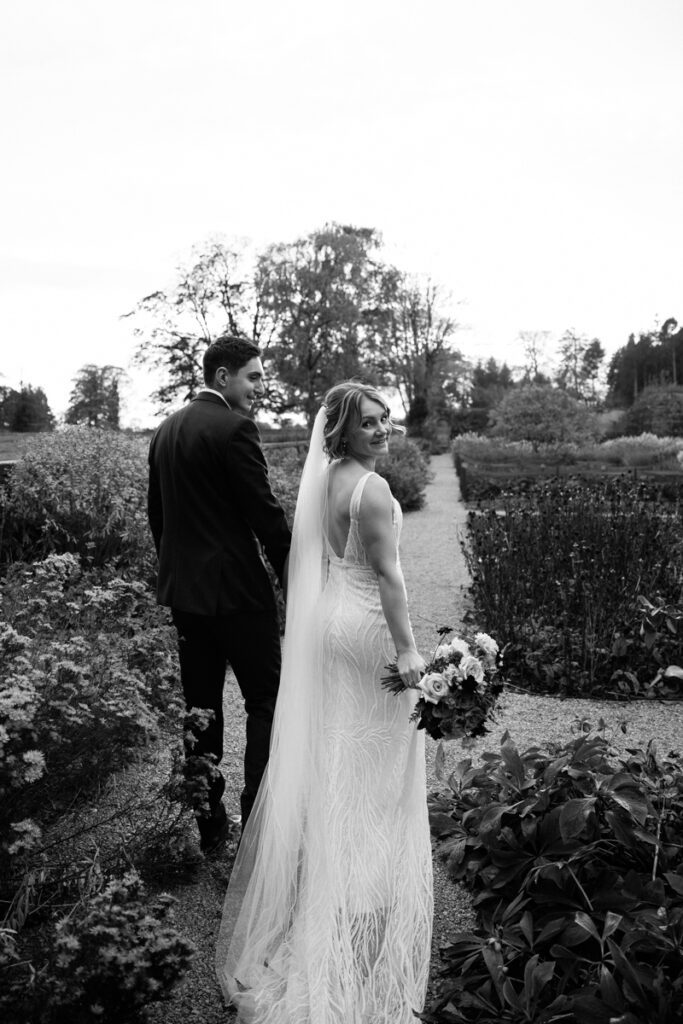 Bride and groom in walled garden at Middleton Lodge