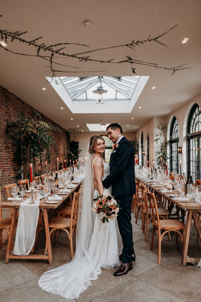 Bride and groom in The Fig House at Middleton Lodge