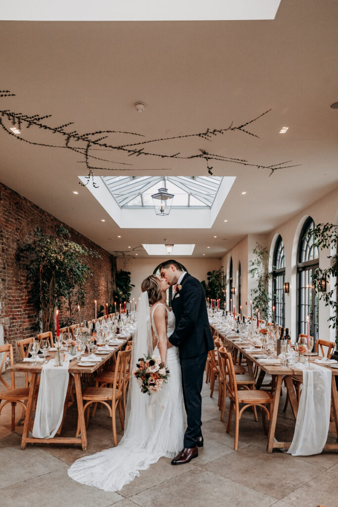Bride and groom in The Fig House at Middleton Lodge