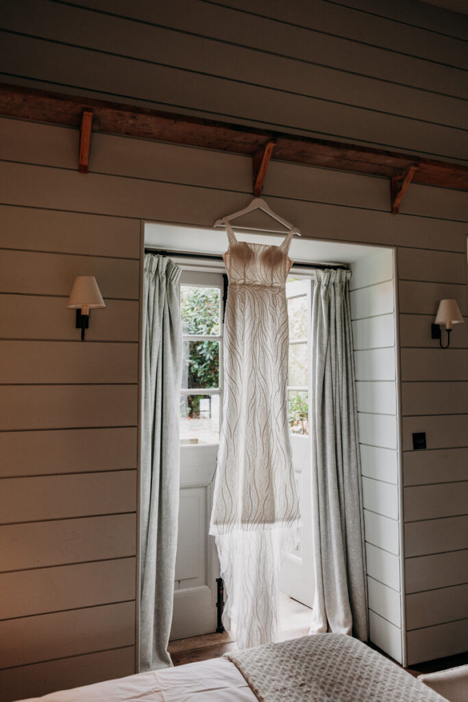 Hanging wedding dress at Middleton Lodge