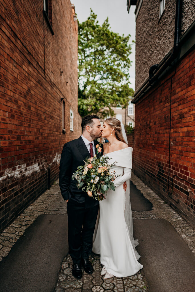 Bride and Groom kissing in York Street