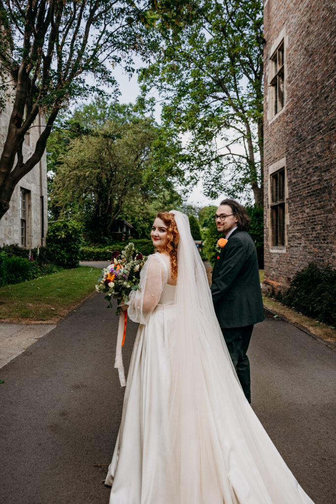 Bride and Groom walking near York University