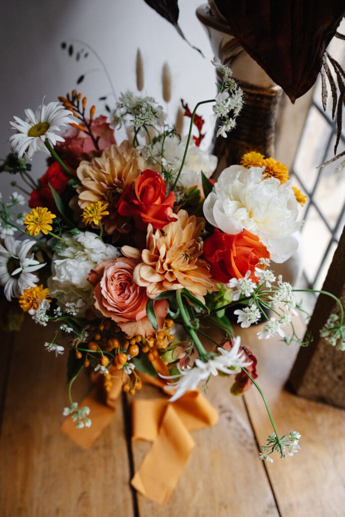 colourful wedding bouquet by window